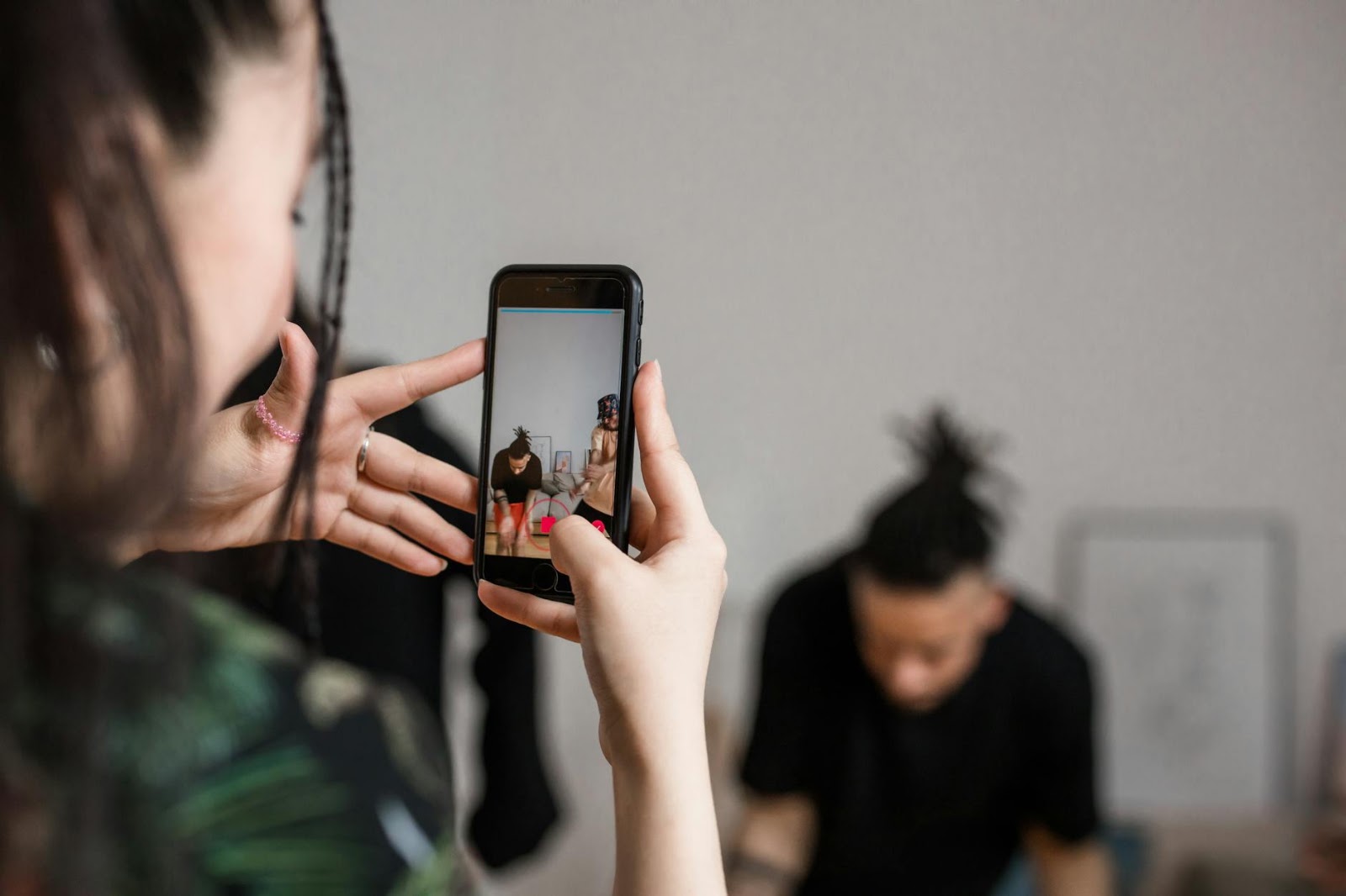Consumer engaging with dynamic vertical video content, highlighting live social media shopping trends and instant purchases.