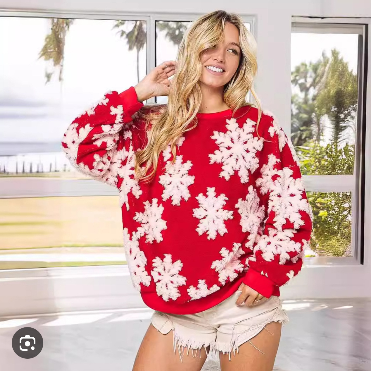 Women's knitted sweater with floral embroidery