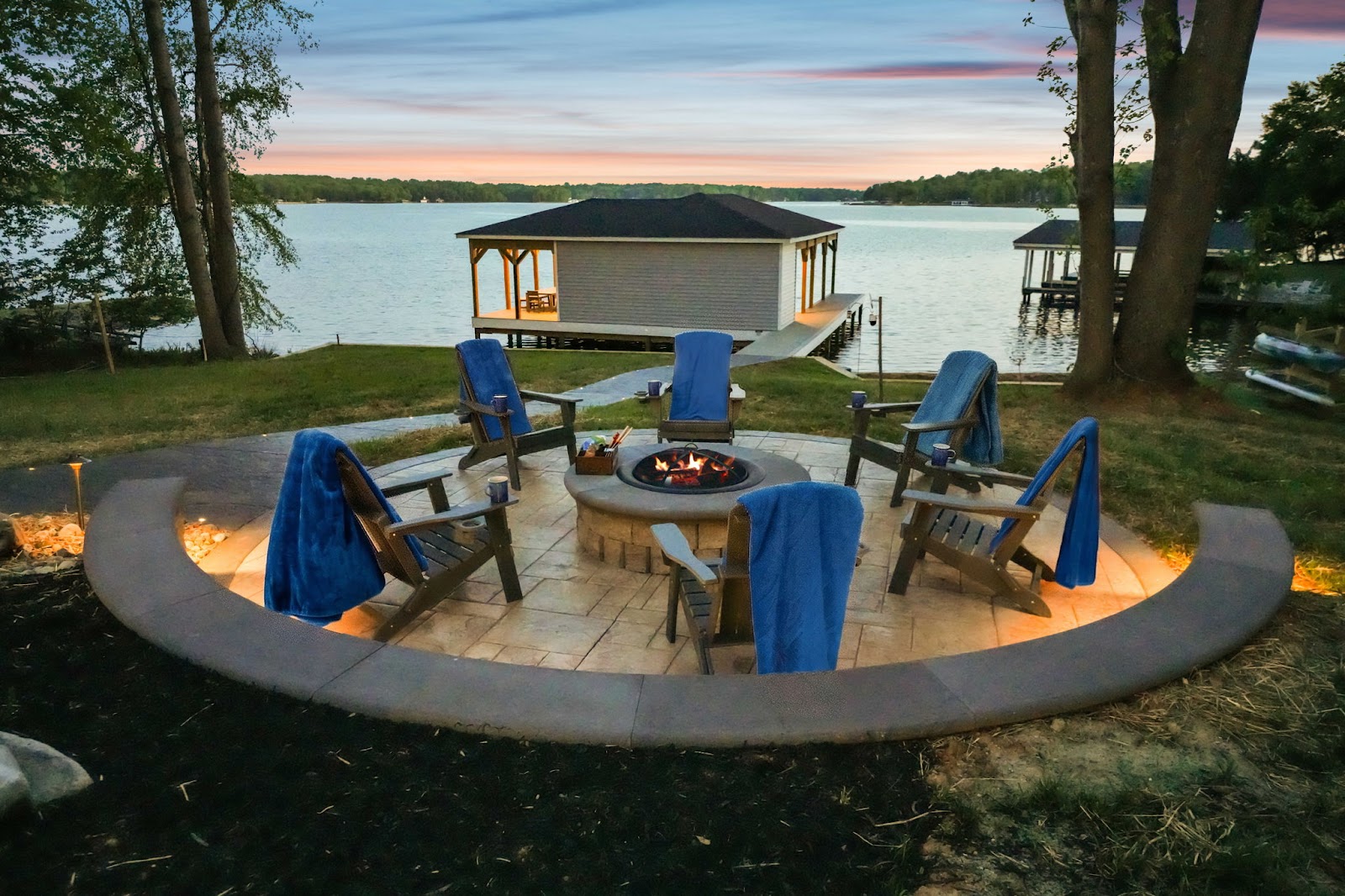 Fire pit patio with lake view at sunset