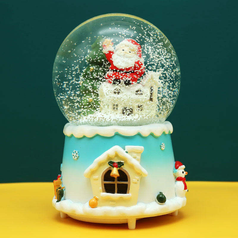 Weihnachtliche Schneekugel mit Musik und Licht