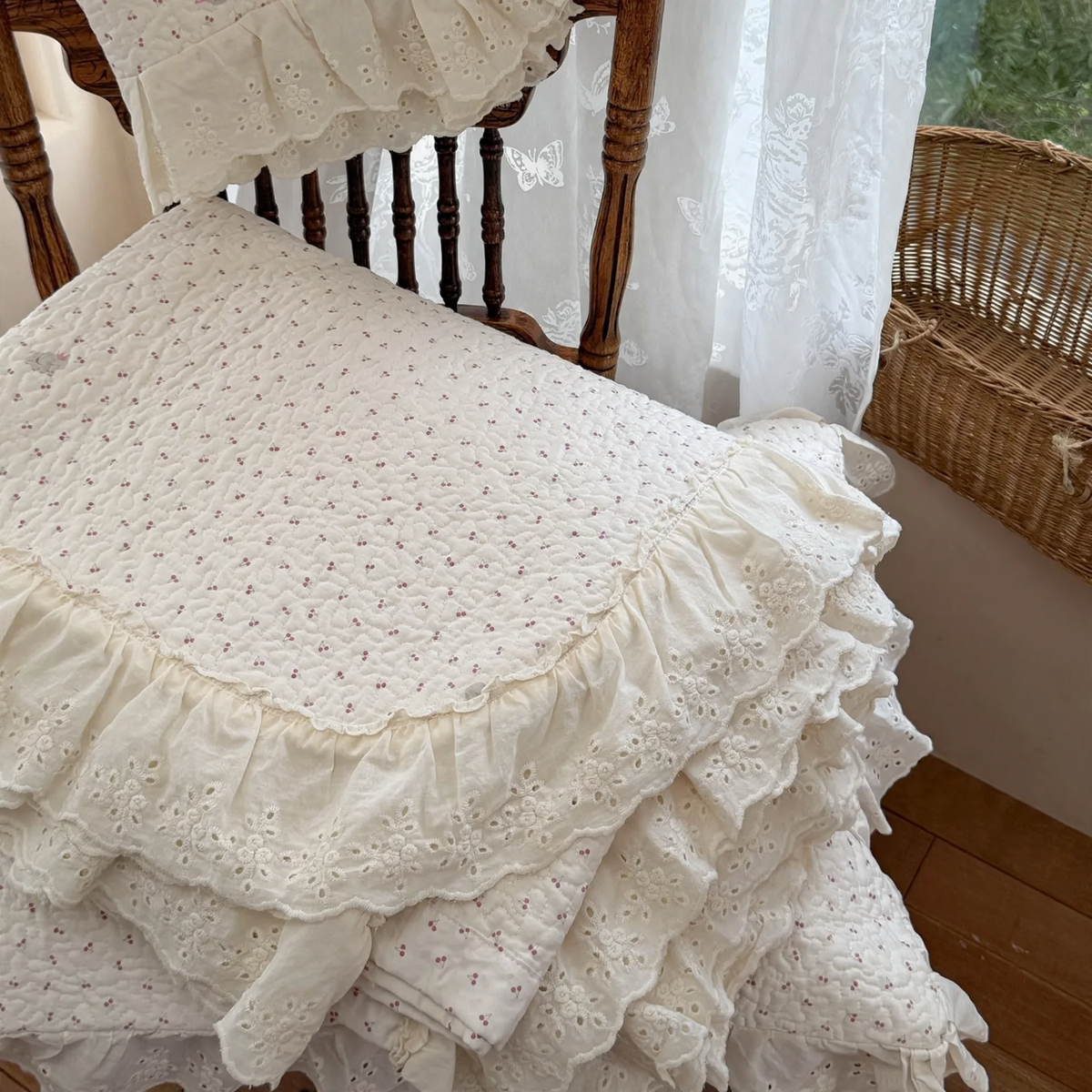 Cotton bedspread with lace trim, quilted