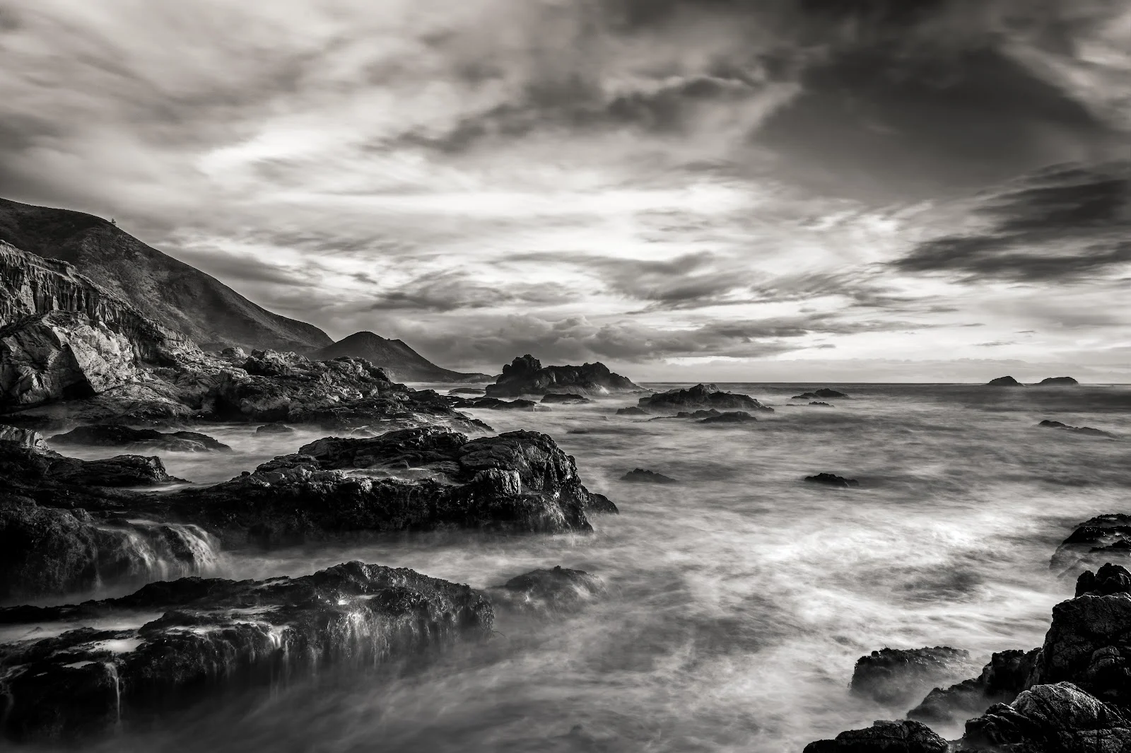 Rocky Coastline Under Dramatic Sky - Monochrome Landscape Photography 5K Wallpaper (6003x3994)