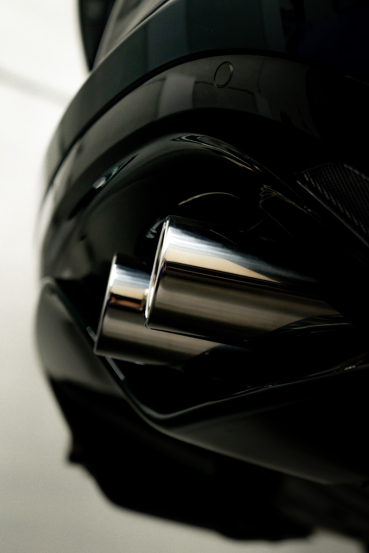 Jaguar F-Type polished exhaust tip detail at ZAutoCare