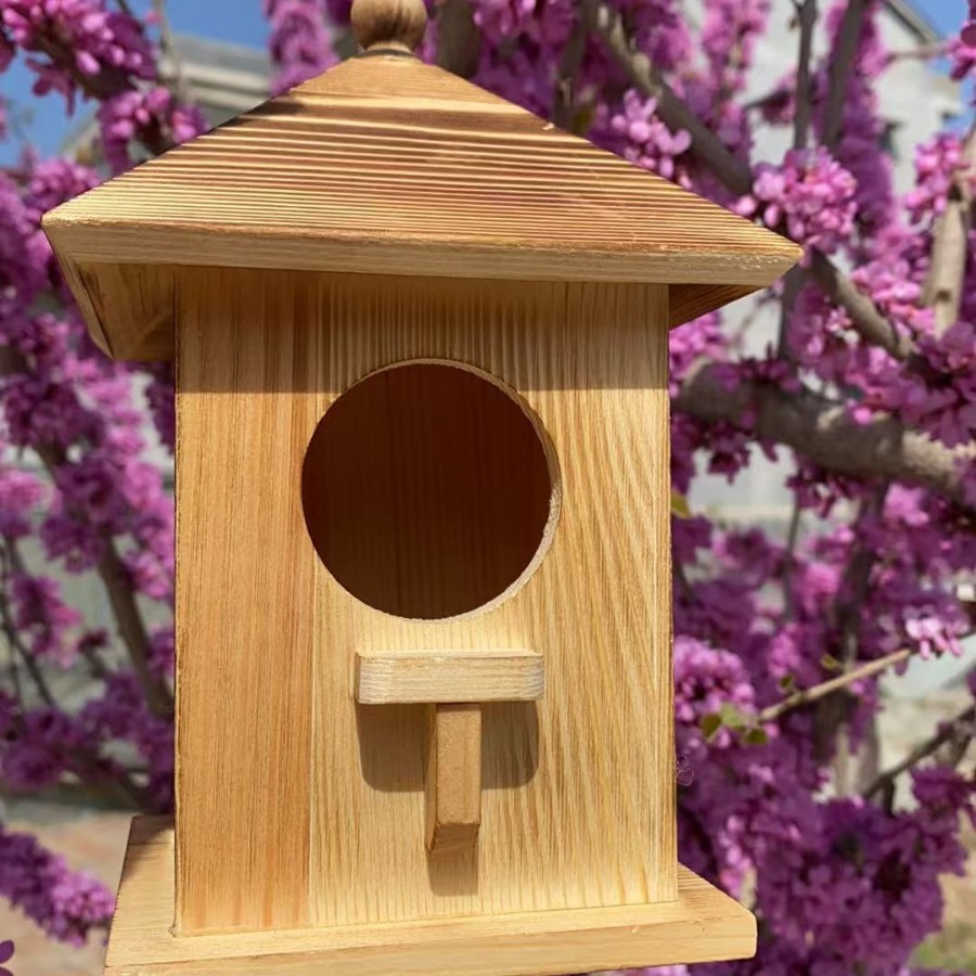 Holz-Vogelhaus und Futterstation für den Garten