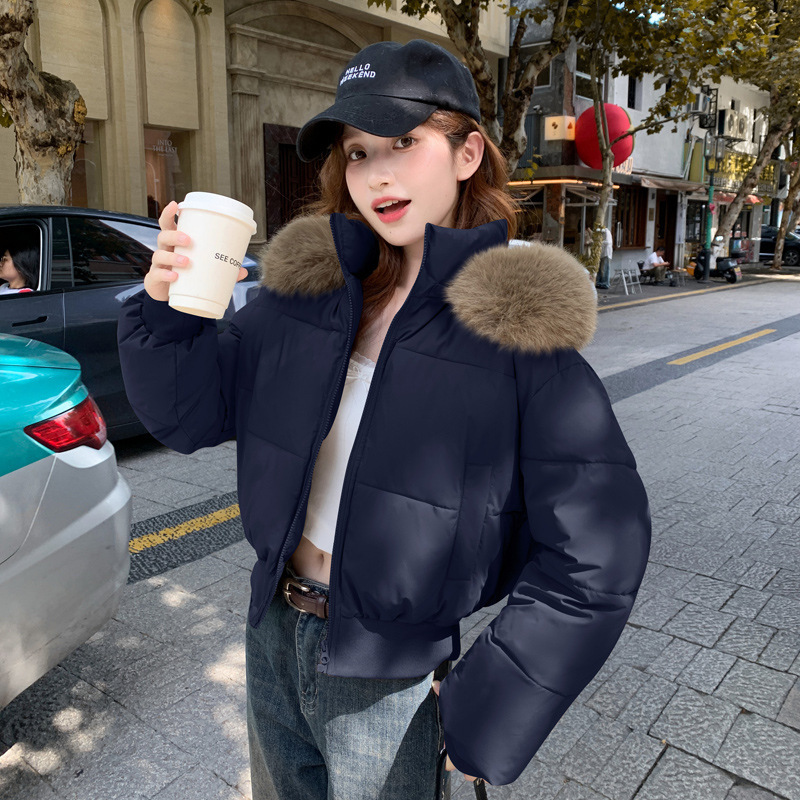 Short women's winter jacket with a removable hood