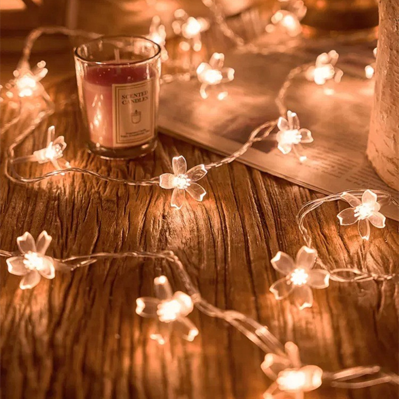 LED string light with holiday motifs for festive decoration