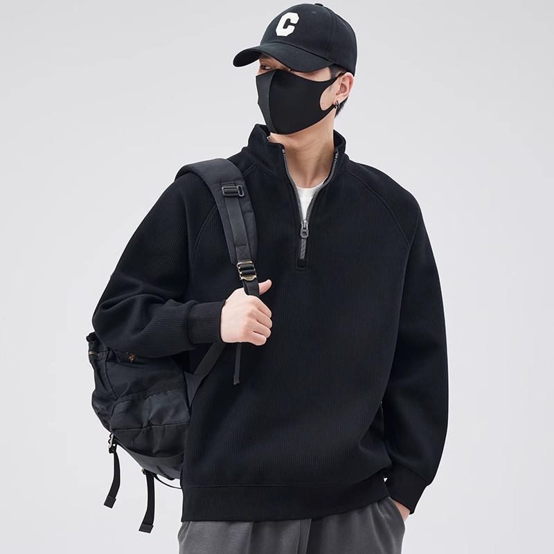 Loose sweater with stand-up collar and zipper