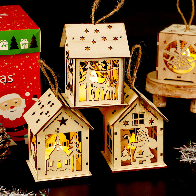 Illuminated wooden house for Christmas