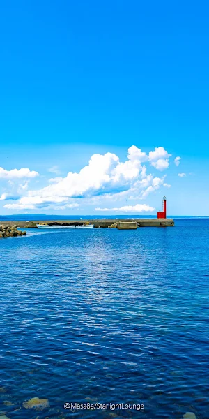 Red Lighthouse by Blue Sea 4K Wallpaper Background