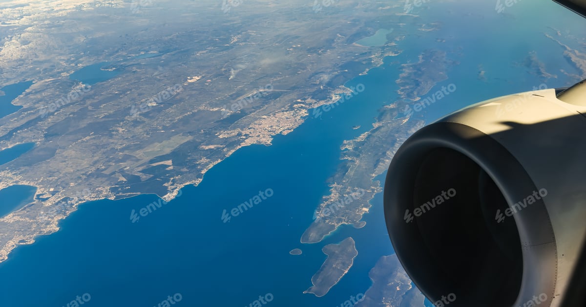 Aerial View From Airplane Over Coastal Landscape Free Download – Envato Elements