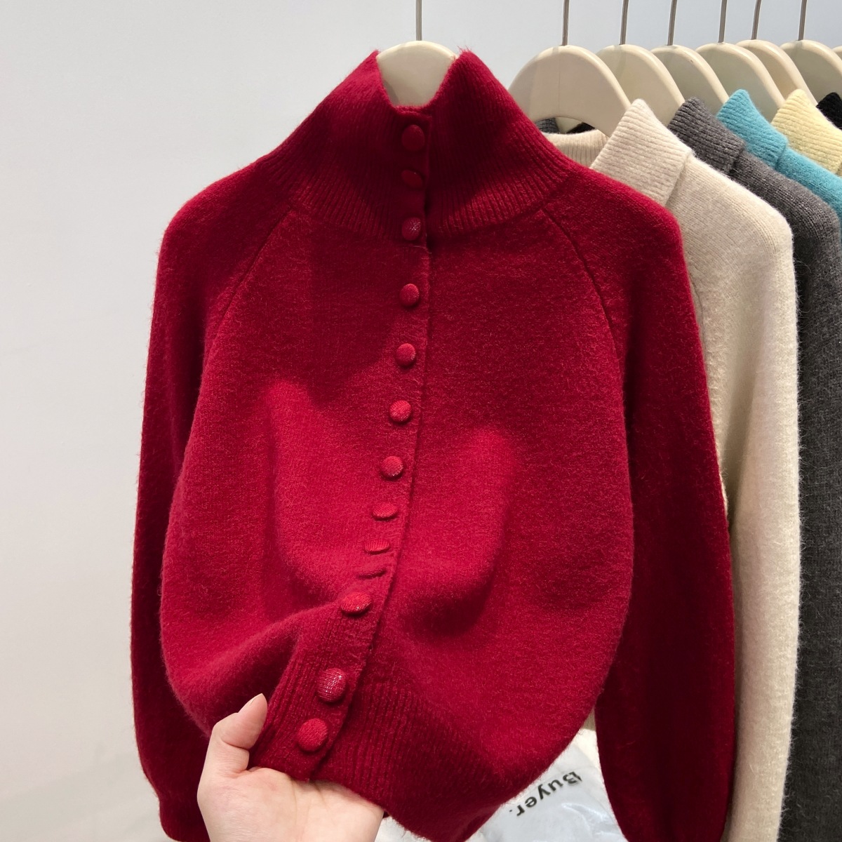 Women's cardigan with stand collar and button placket