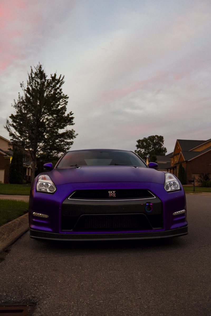 Automotive photography featuring purple Nissan GT-R