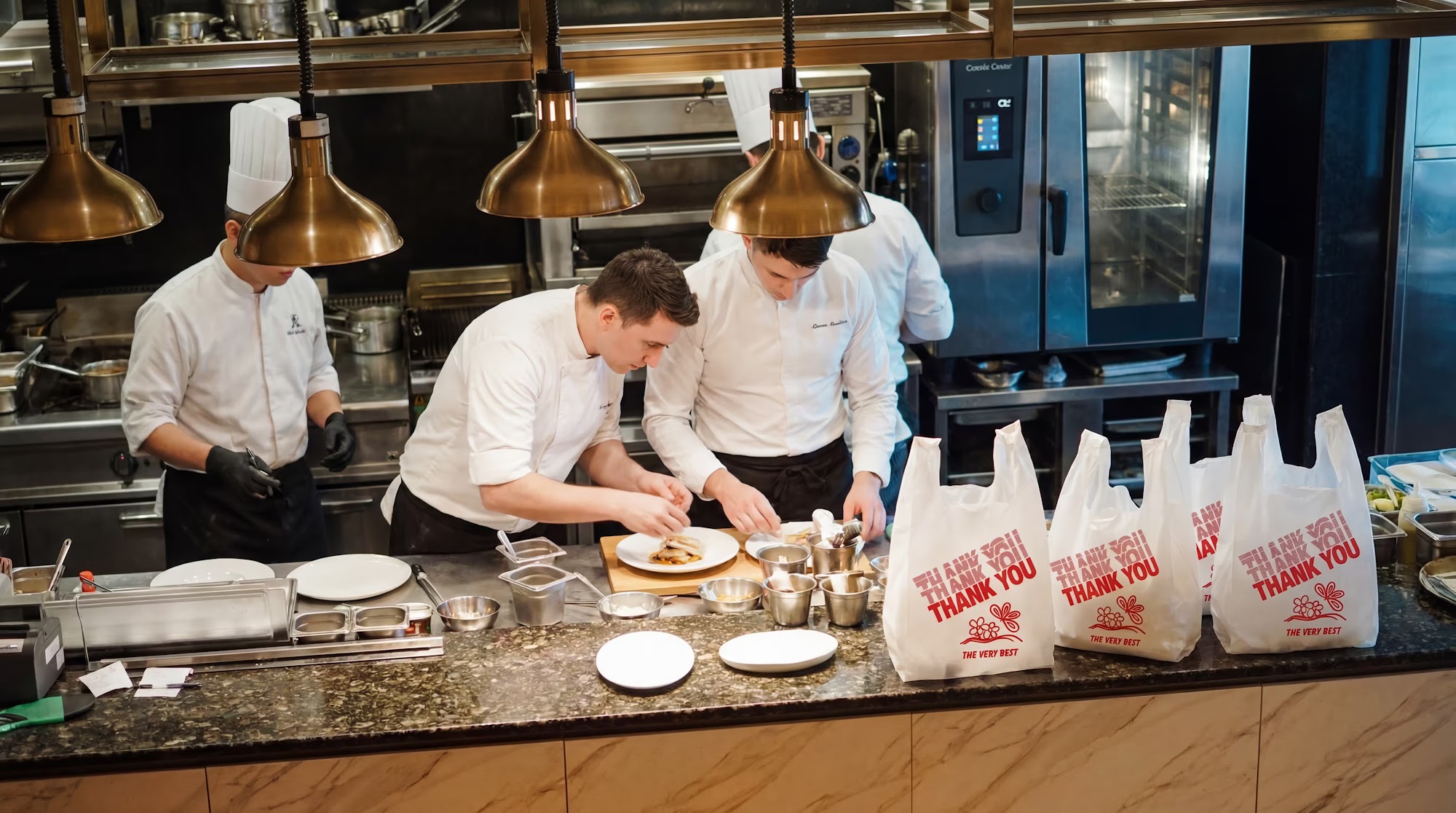 BetterBag+ takeout bags lined up in a working kitchen