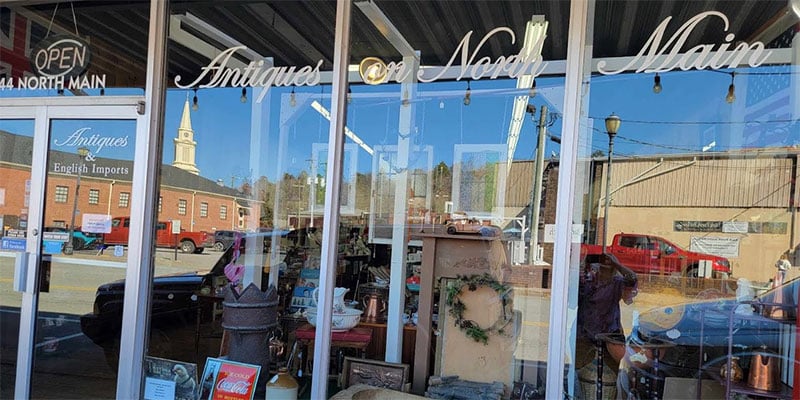 Antique shop storefront on North Main Street in downtown Ellijay, Georgia, near Orchard & Vine Mountain Haus