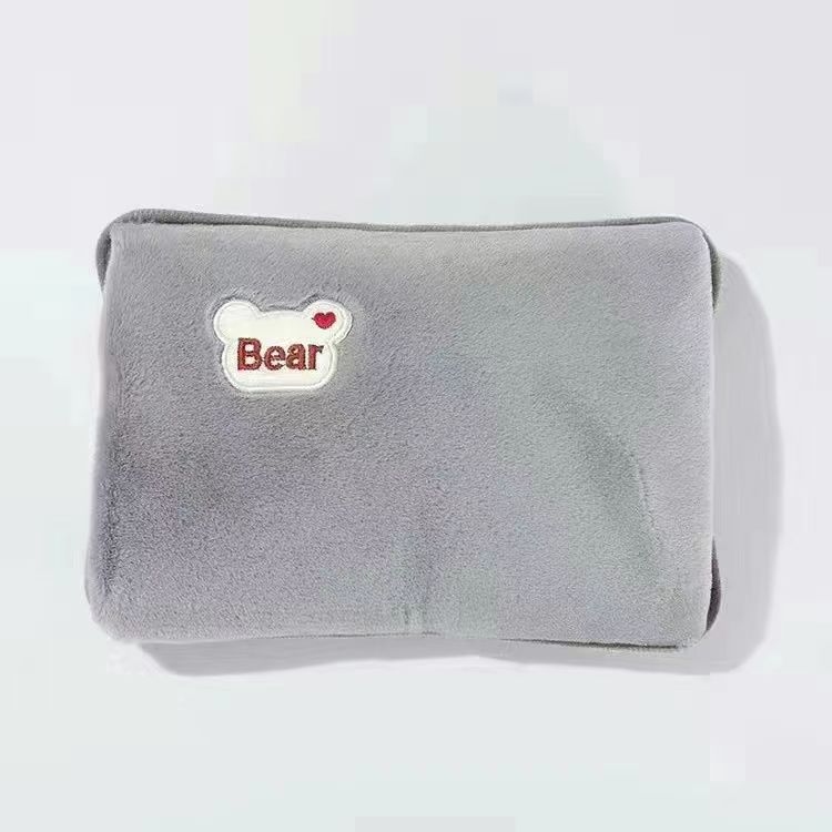 Electric hot water bottle with plush cover