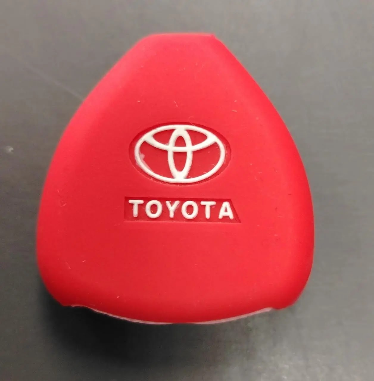 goma protector de control toyota rojo