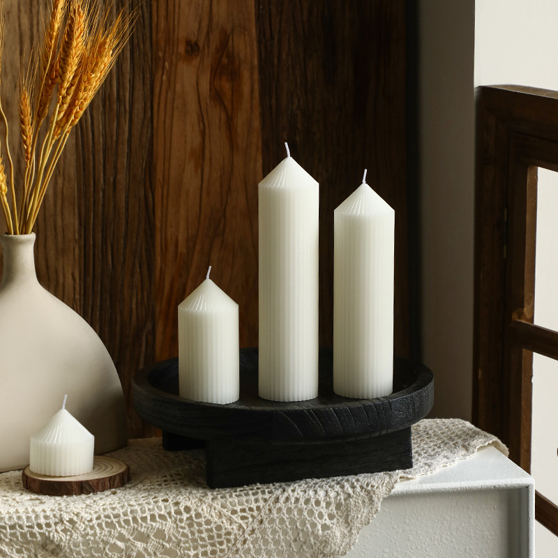 White spire candle with stripe pattern, Nordic