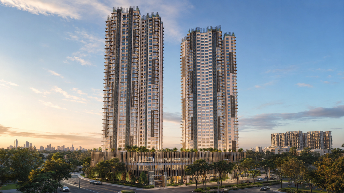 Three residential towers above a landscaped podium
