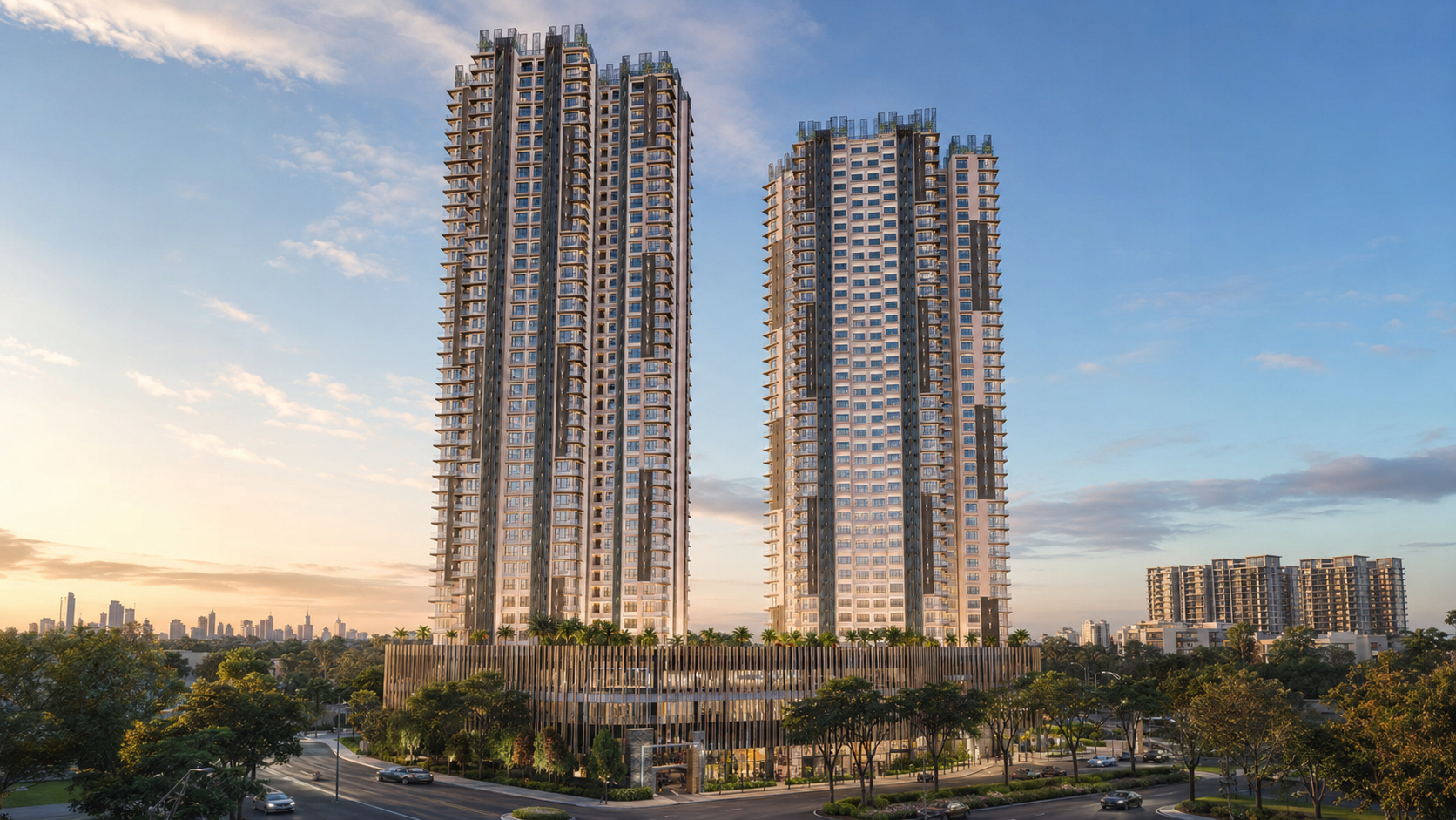 Three residential towers above a landscaped podium