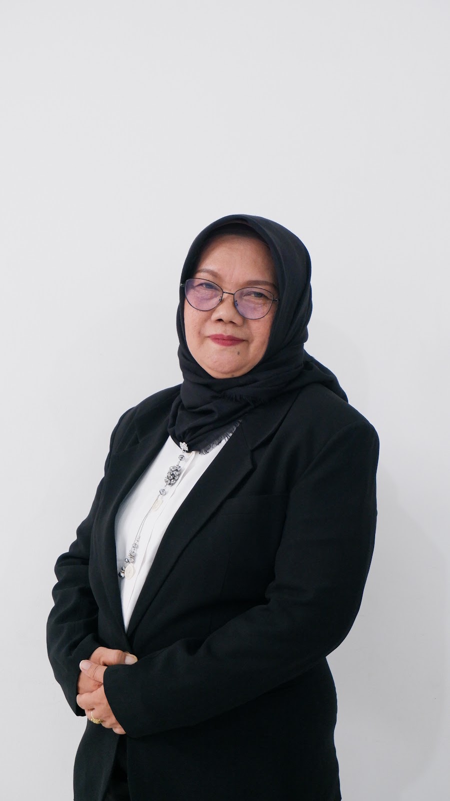 Foto Dr. Dra. R.A. Marlien, M.M.