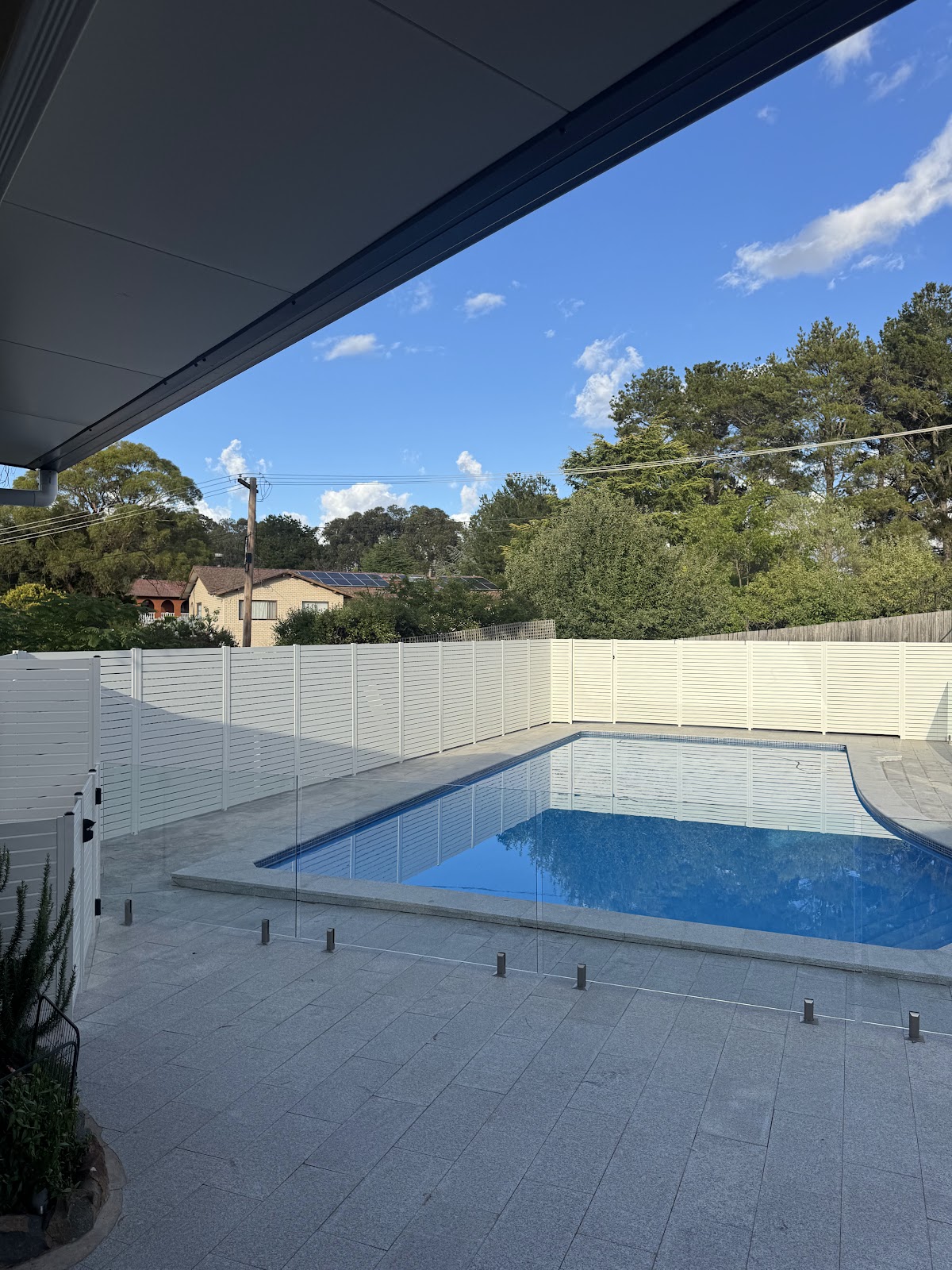 Glass pool fence with pool view