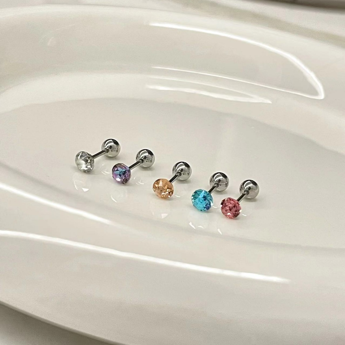 Titanium piercing bar with internal threading