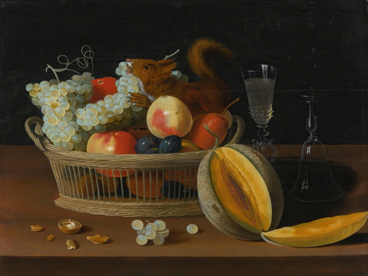 Still Life With A Basket Of Fruit AndA Squirrel Glasses And A Cut Melon On A Tab