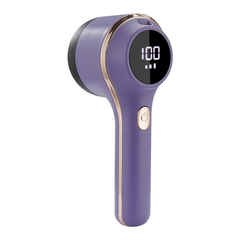 Portable battery-operated lint remover with display