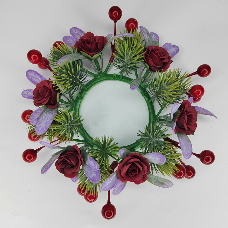 Christmas candle wreath with roses and pine needles