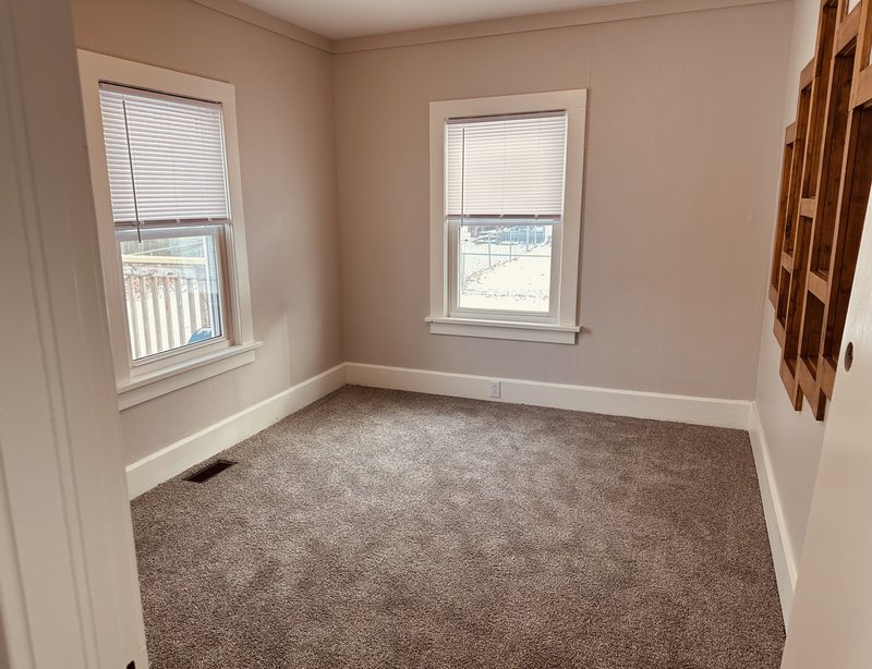 Finished room with fresh paint and new flooring in Woodford County IL