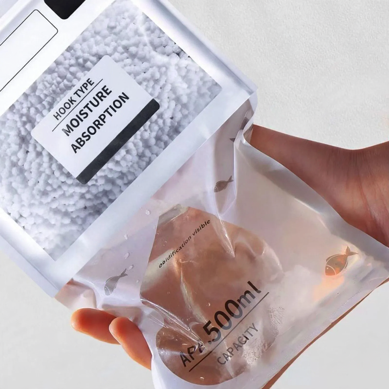 Hanging dehumidifying bag for wardrobes