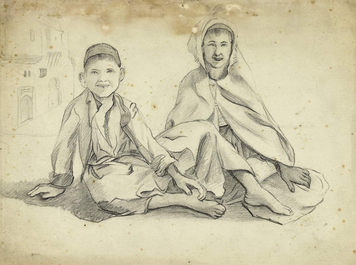 Deux enfants arabes assis