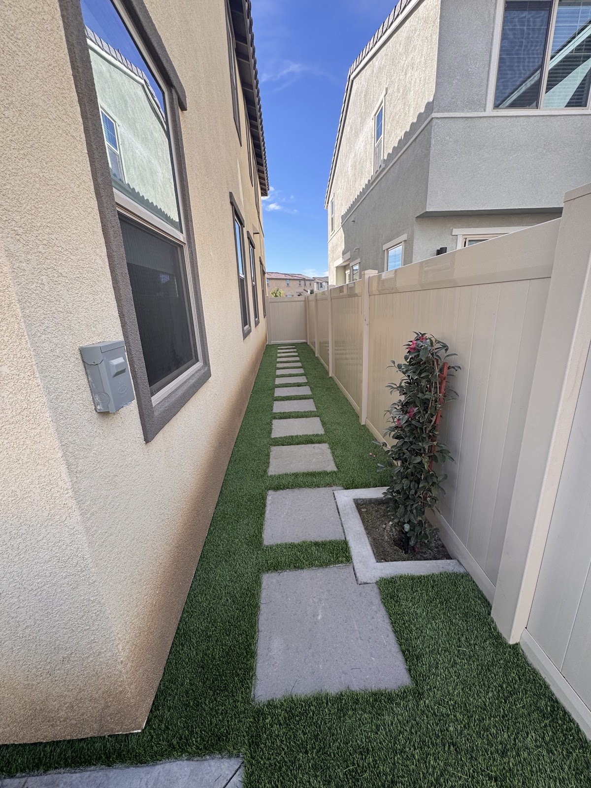 Beautiful backyard transformation with artificial turf