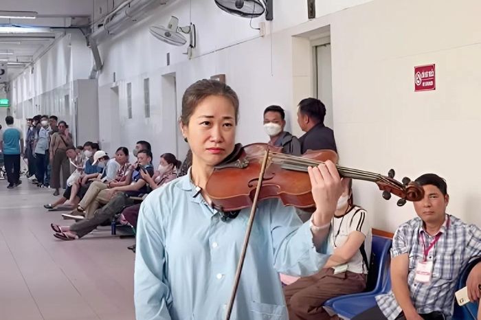 Nghệ sĩ Nguyệt Thu chơi viola ở hành lang bệnh viện: Lời cầu nguyện sau ca cấp cứu - Báo VietnamNet
