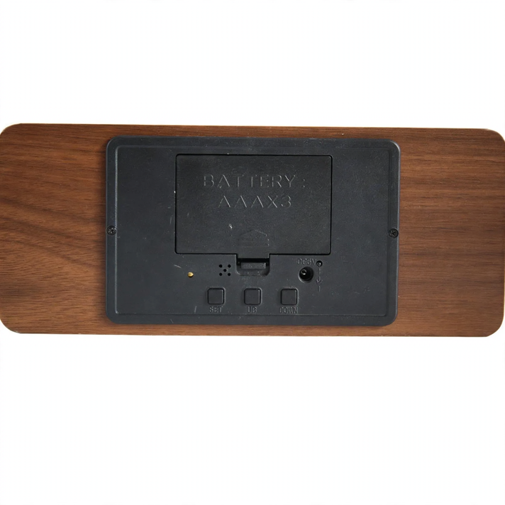Wooden digital clock with wireless charging function for smartphones