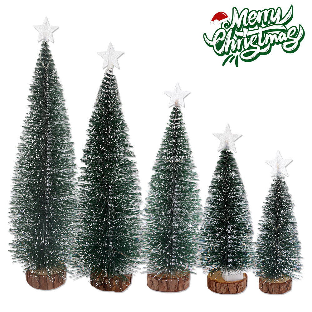 Illuminated mini Christmas tree with snow effect