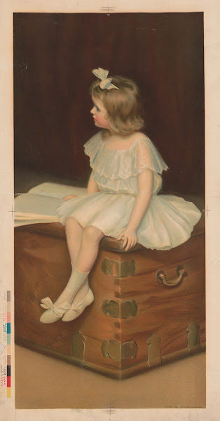 Young girl wearing a white and blue dress sitting on a trunk reading a book 1909