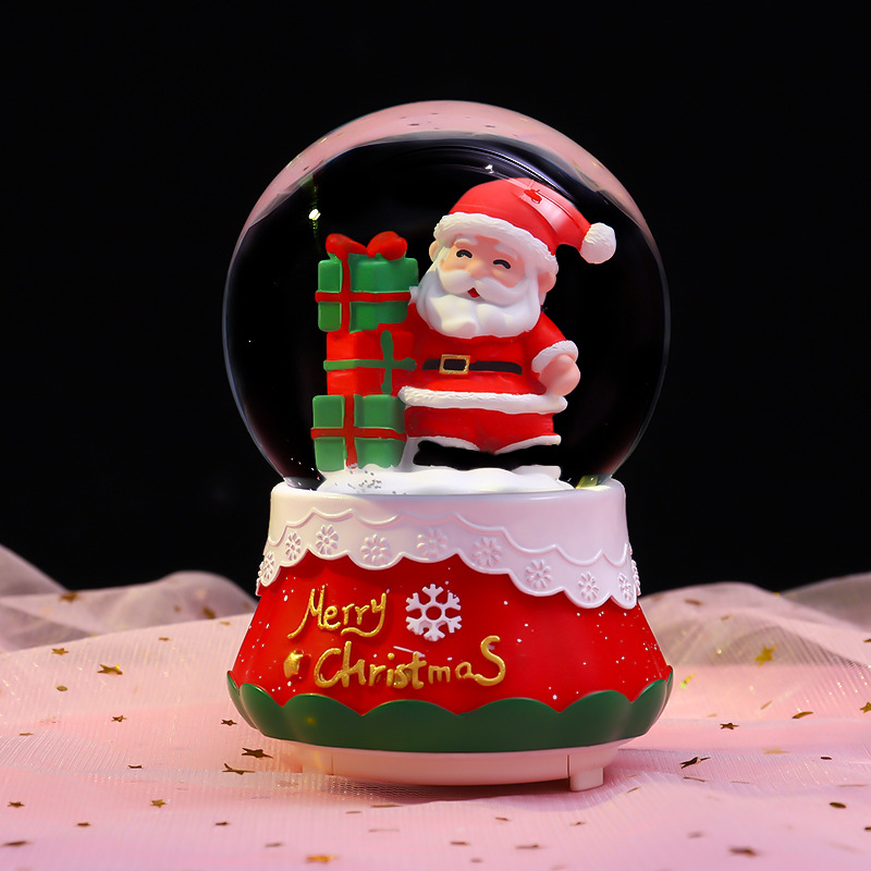 Christmas snow globe with light and music