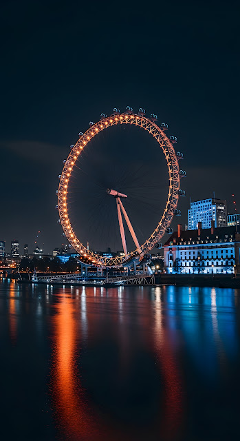 London Eye Illuminated at Night Reflecting on Thames River - Free mobile Wallpaper