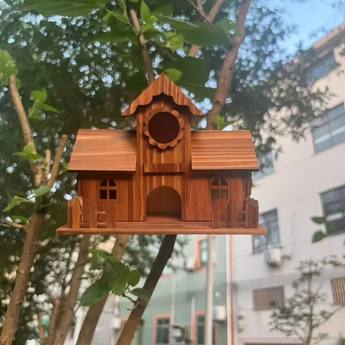 Solid wood birdhouse for the garden