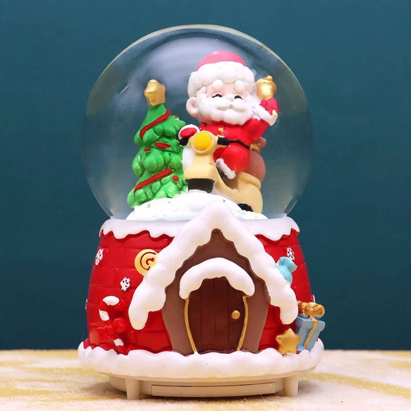 Christmas music box with glass globe and snow effect