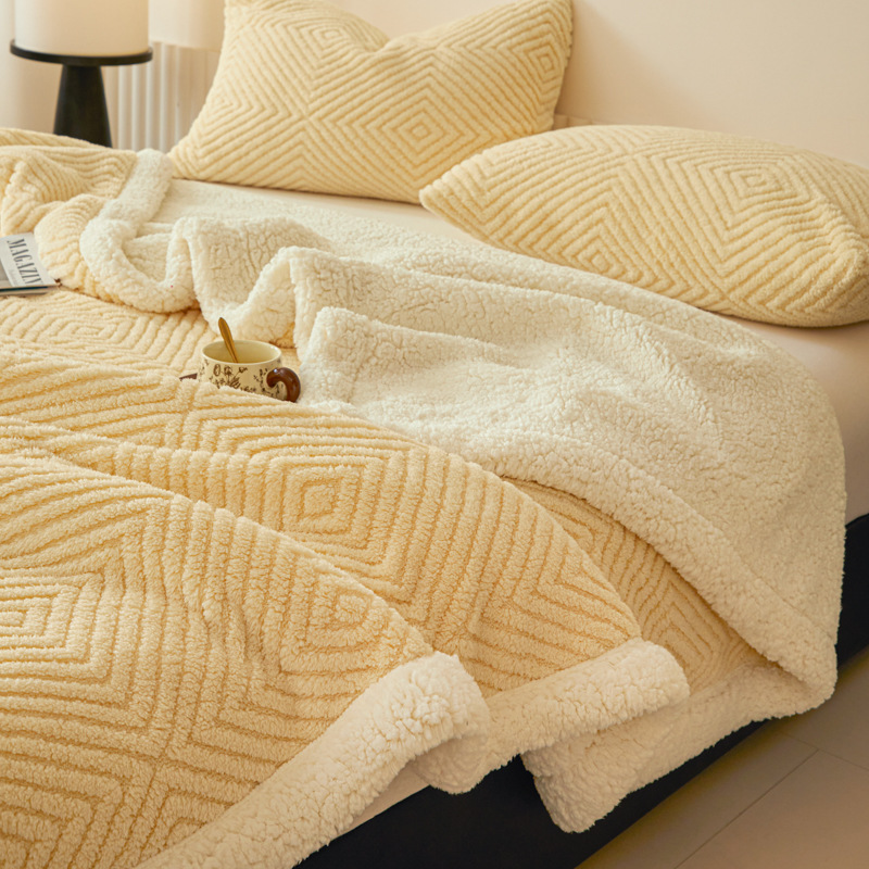 Double-sided lamb fleece blanket with geometric pattern