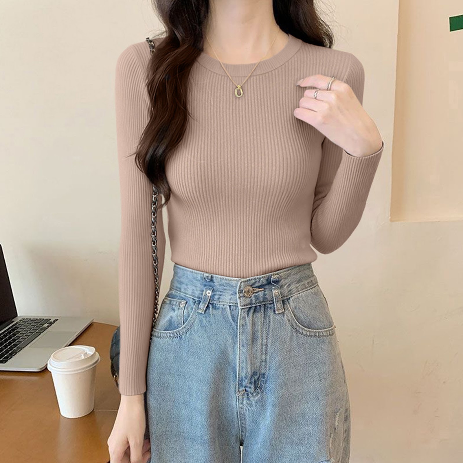 Women's knitted sweater with round neckline