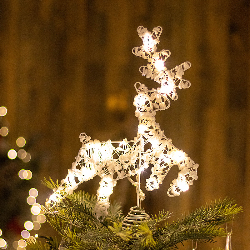 Illuminated Christmas tree topper star made of iron