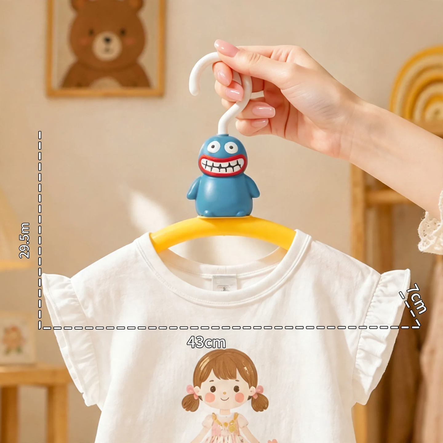 Plastic hanger with monster design