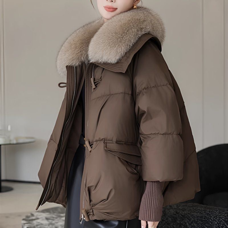 Short women's winter jacket with a large lapel collar