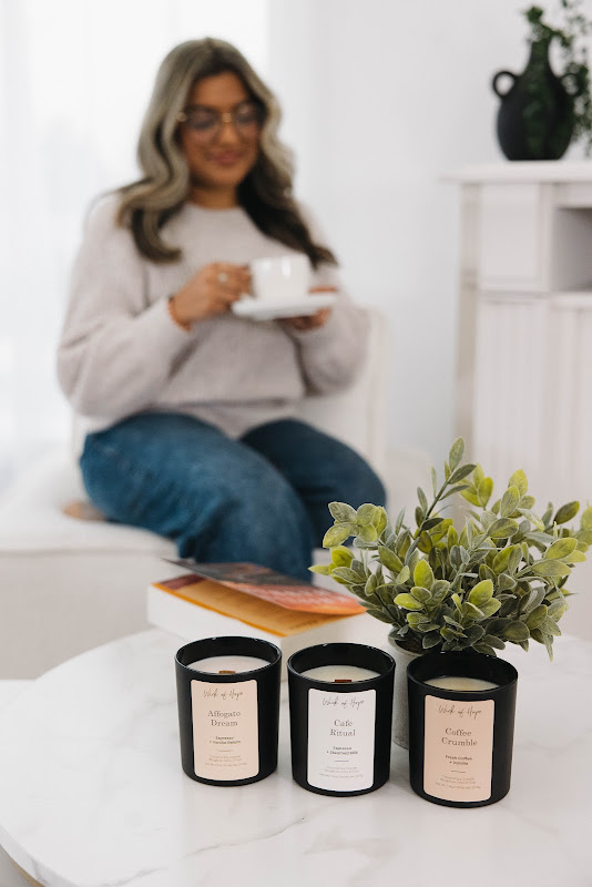 Woman unboxing her first Wick of Hope candle