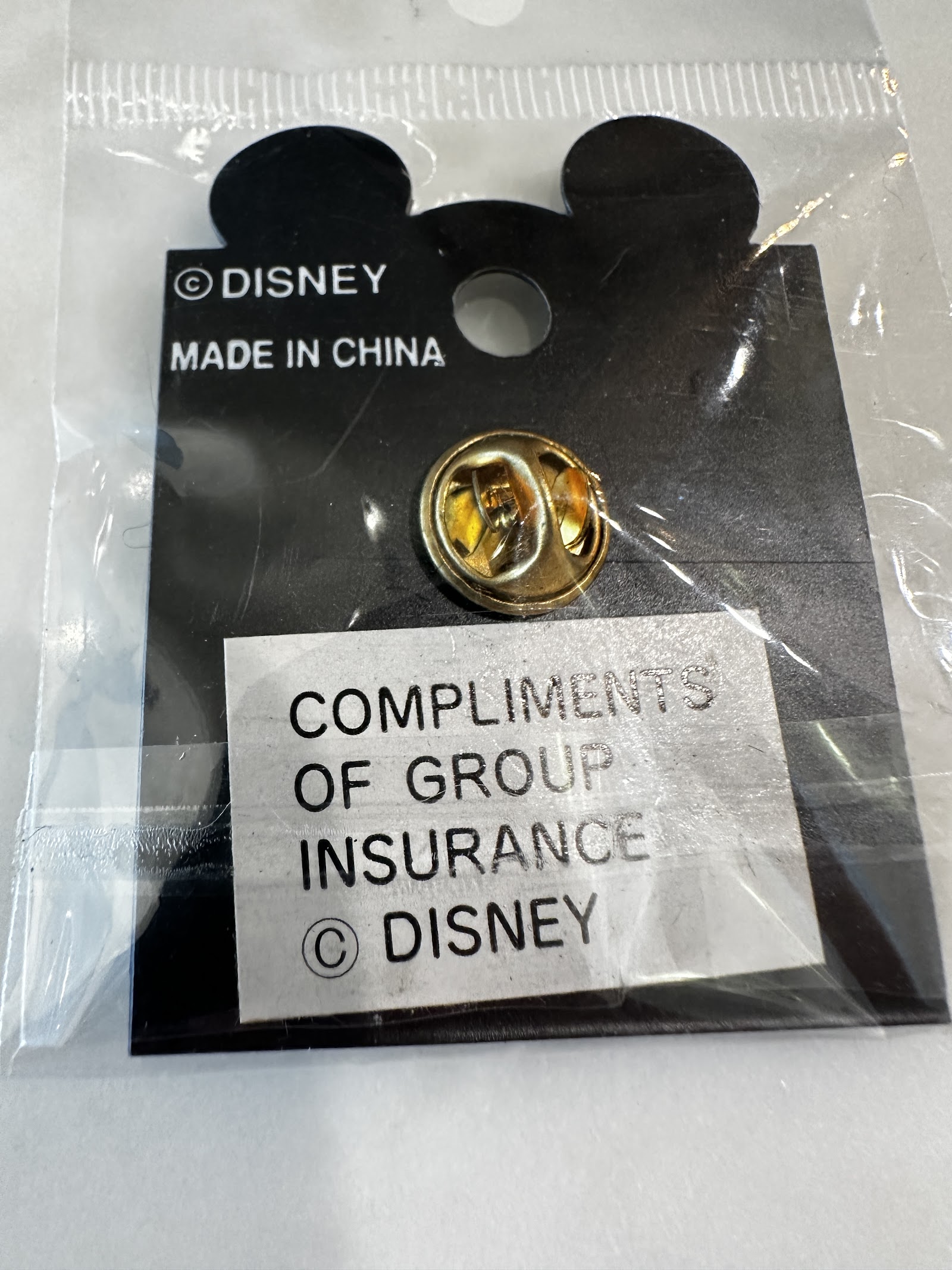 Official Disney enamel trading pin approximately 1.5 inches with metal construction and minimal wear, 2000s era