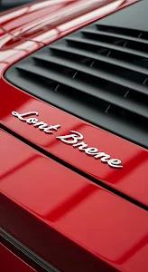 Red Sports Car Engine Bay Vent and Script Badge