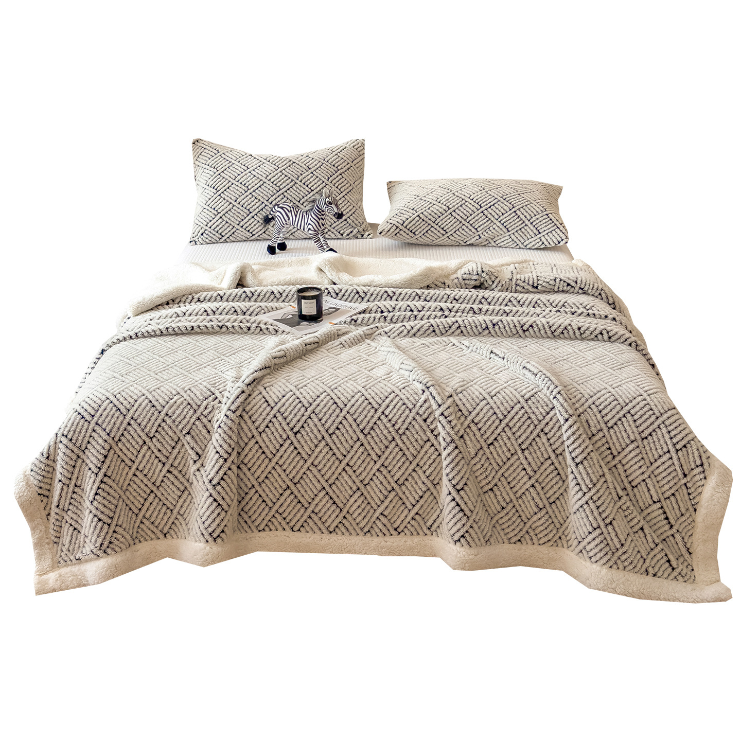 Patterned cozy blanket with lamb fleece look